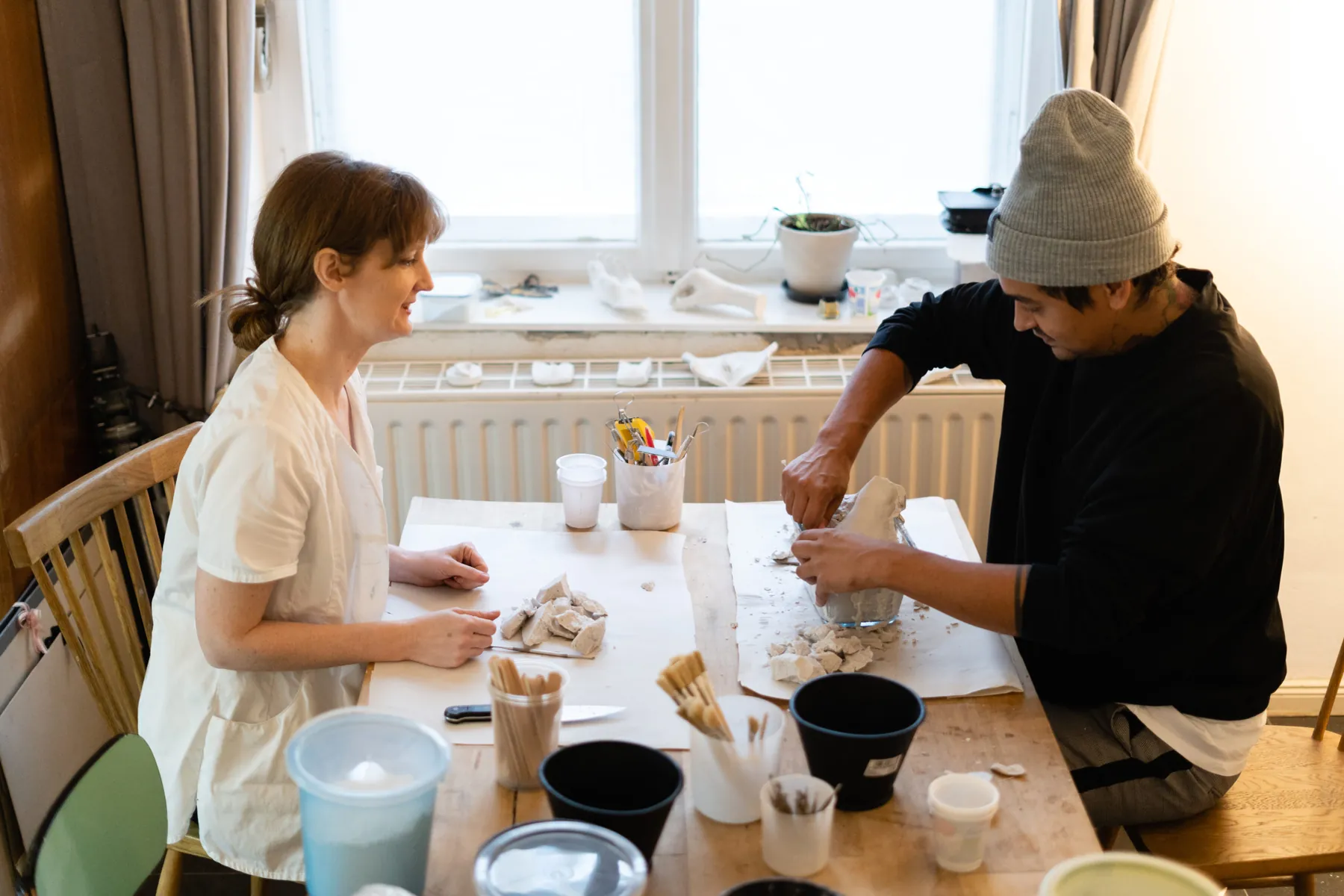 Brooke Meenan teaching a casting workshop at the studio table